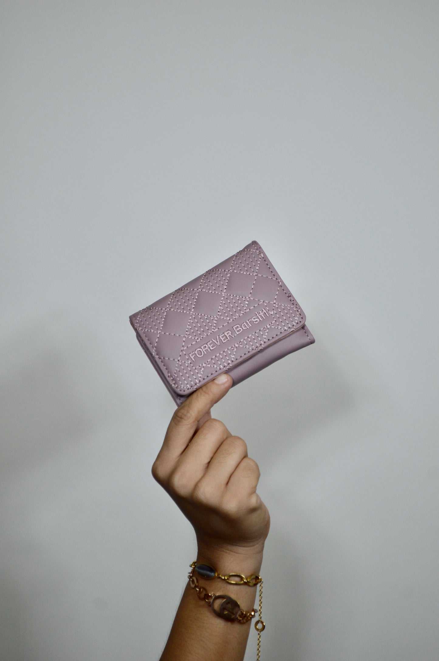 Tarjetero con diseño de rombos