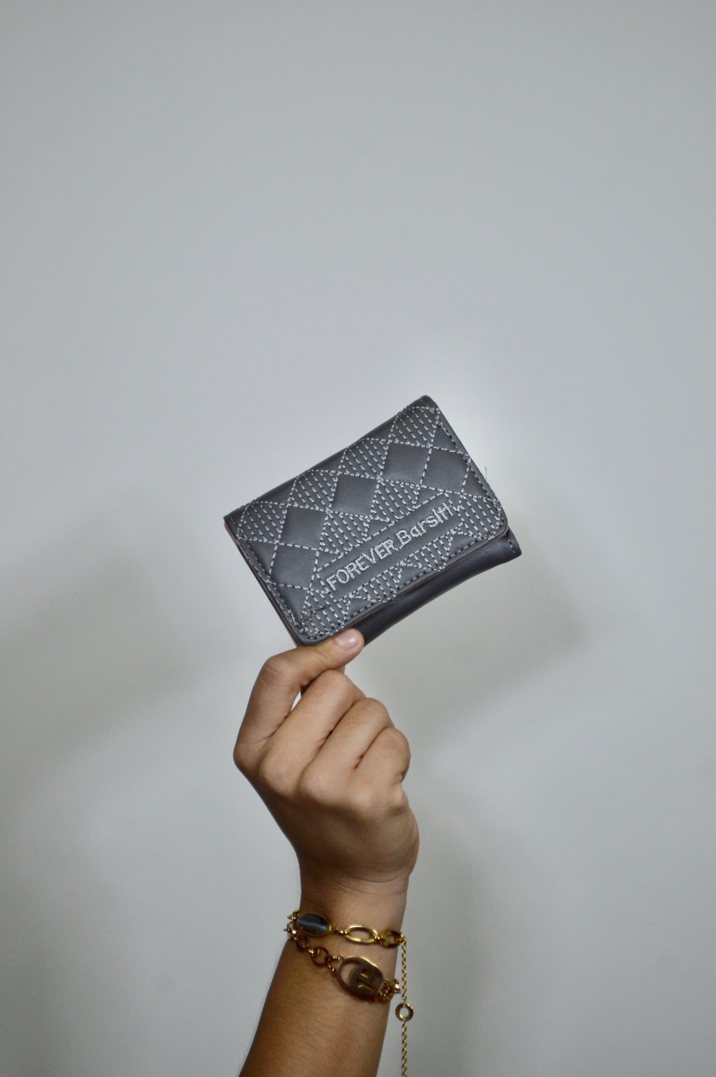 Tarjetero con diseño de rombos