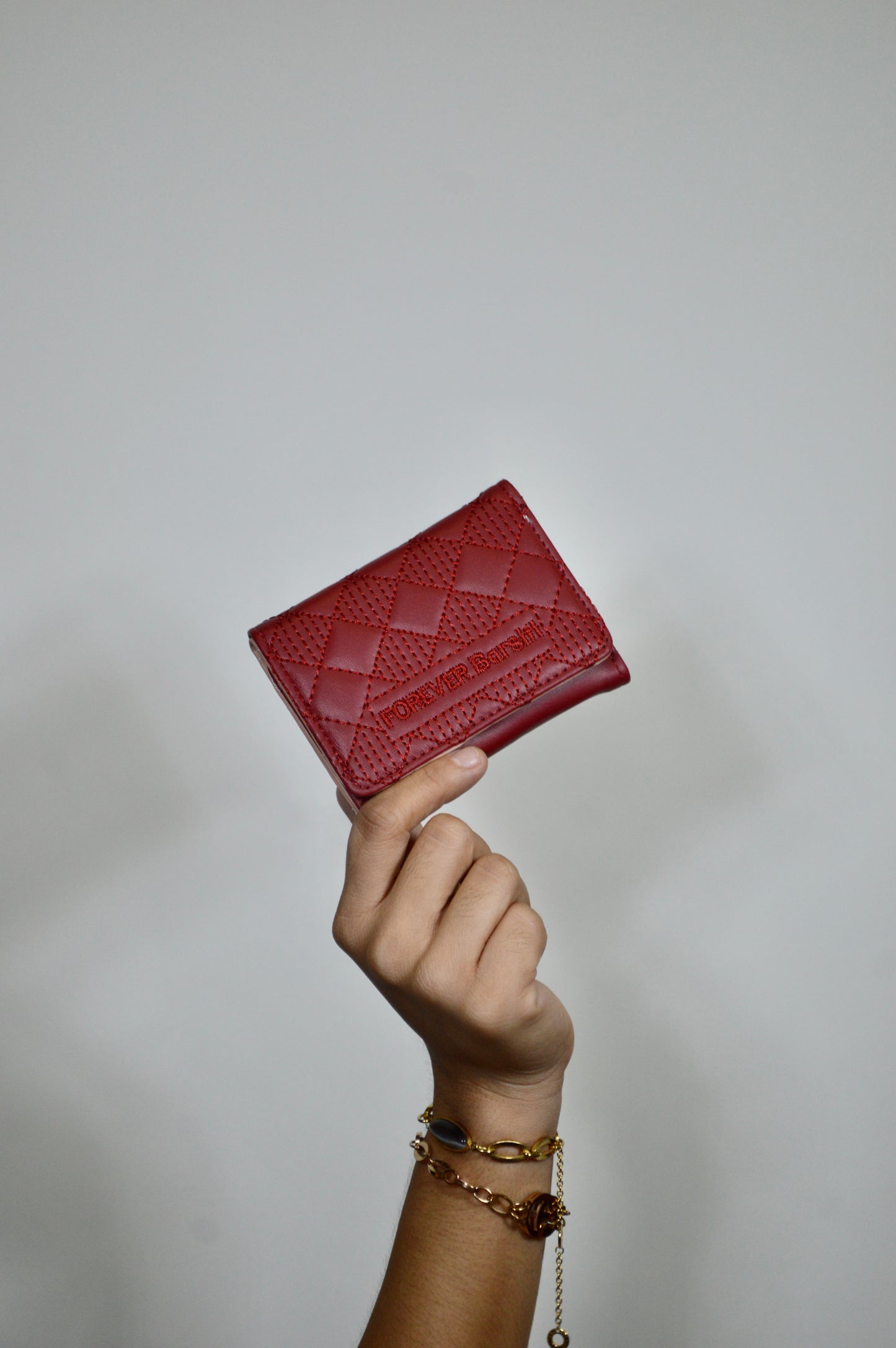 Tarjetero con diseño de rombos