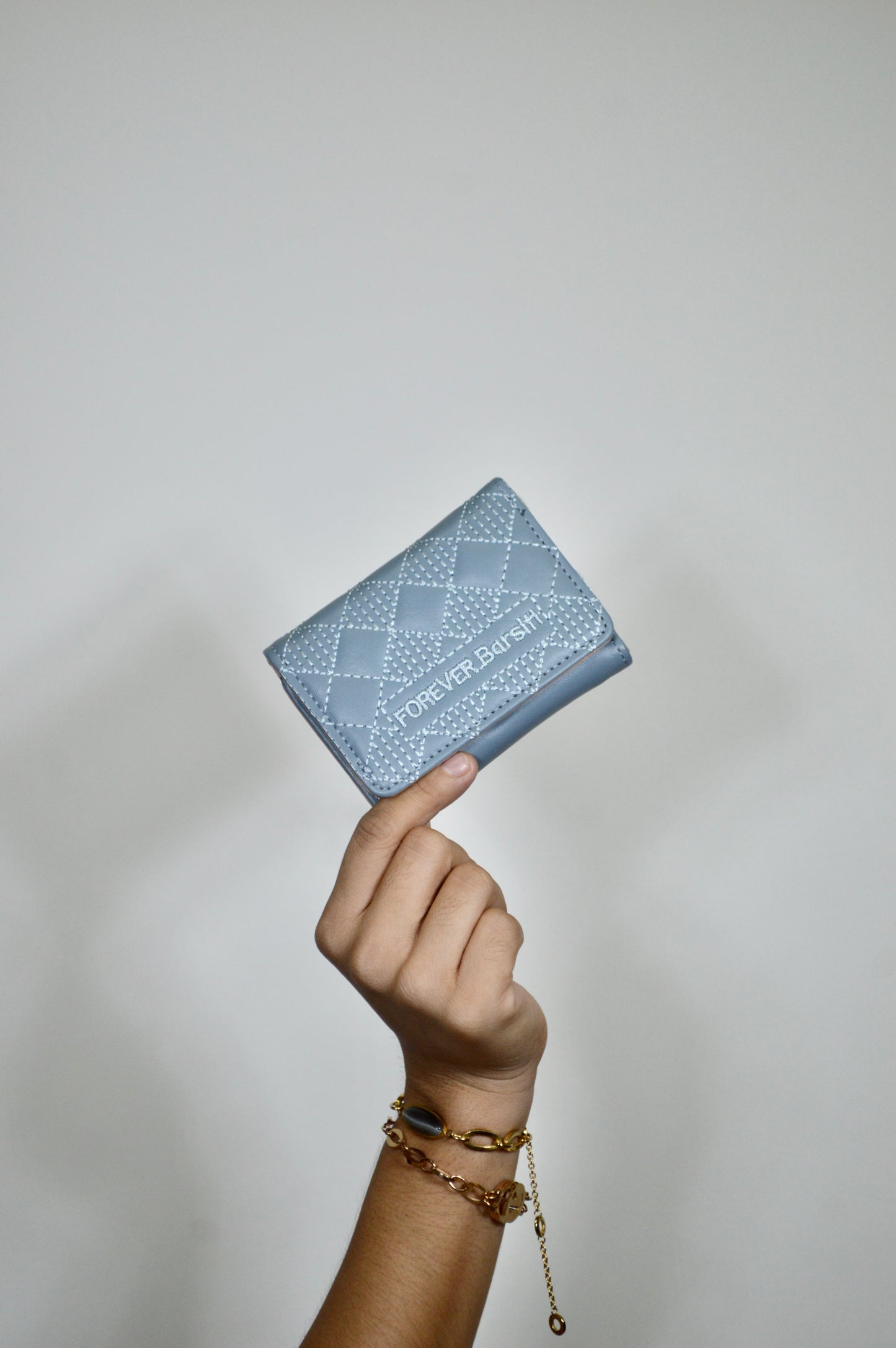 Tarjetero con diseño de rombos