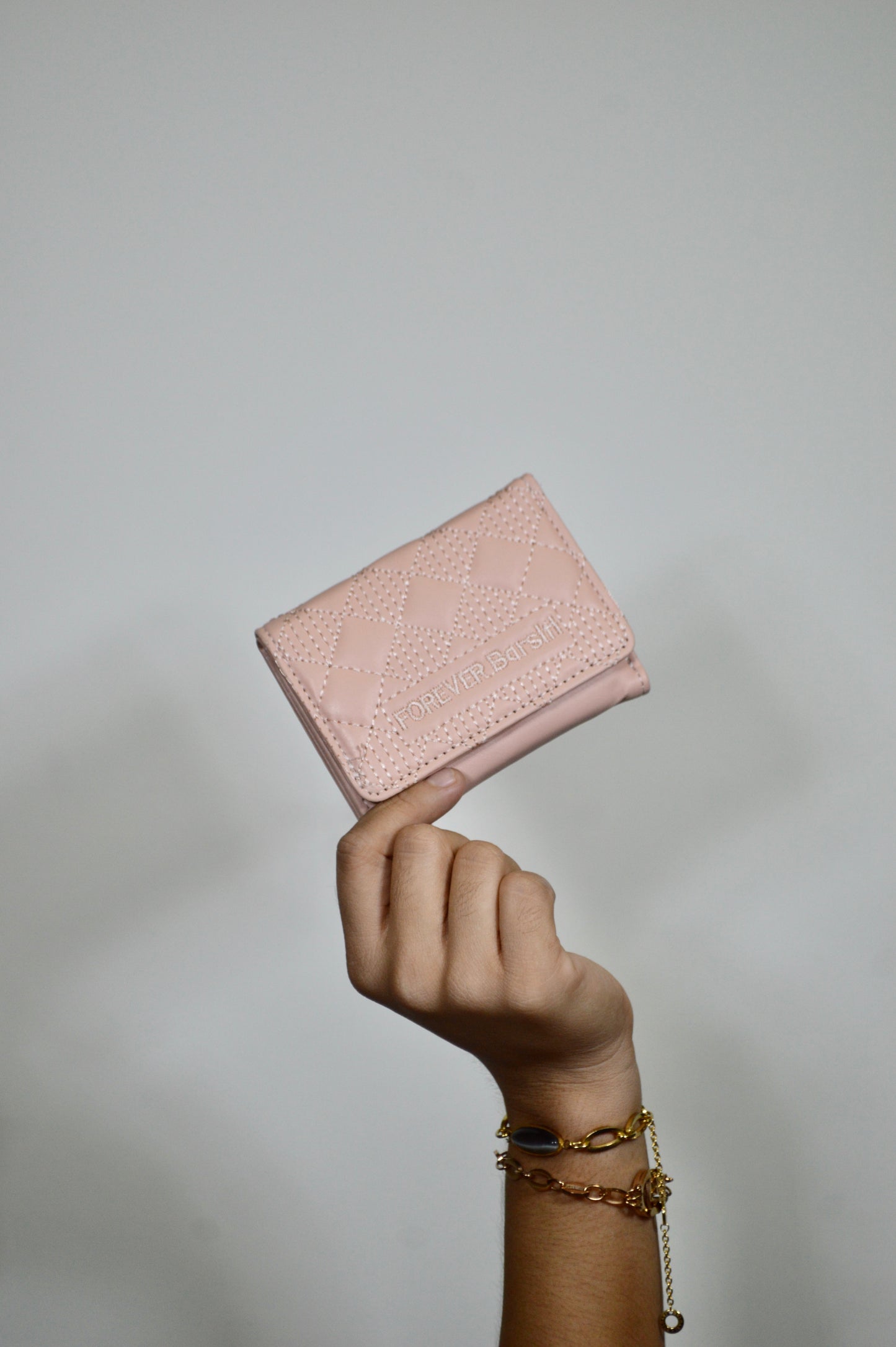 Tarjetero con diseño de rombos